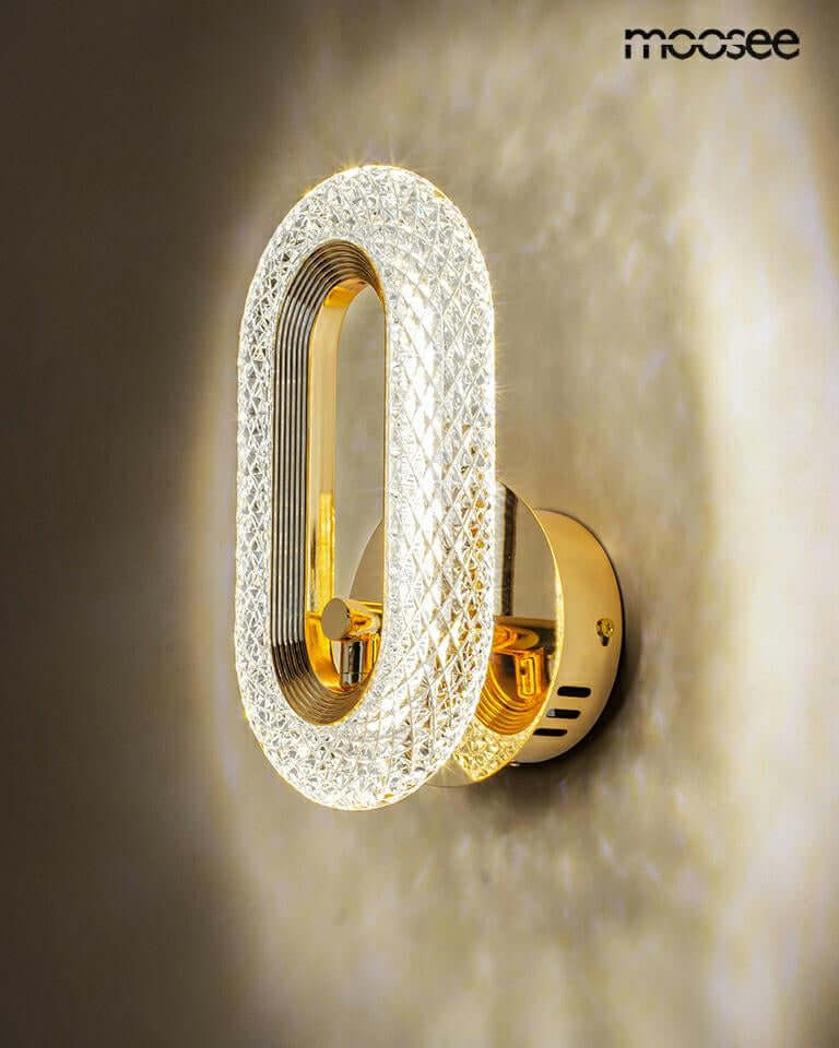 Lámpara de pared joya dorada