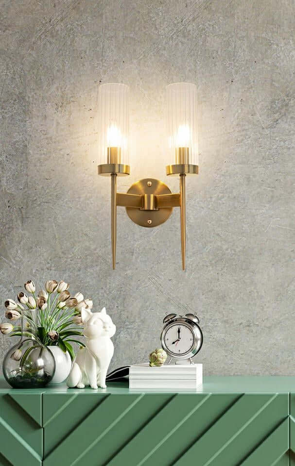 6. Lámpara de pared Torch Twin dorada