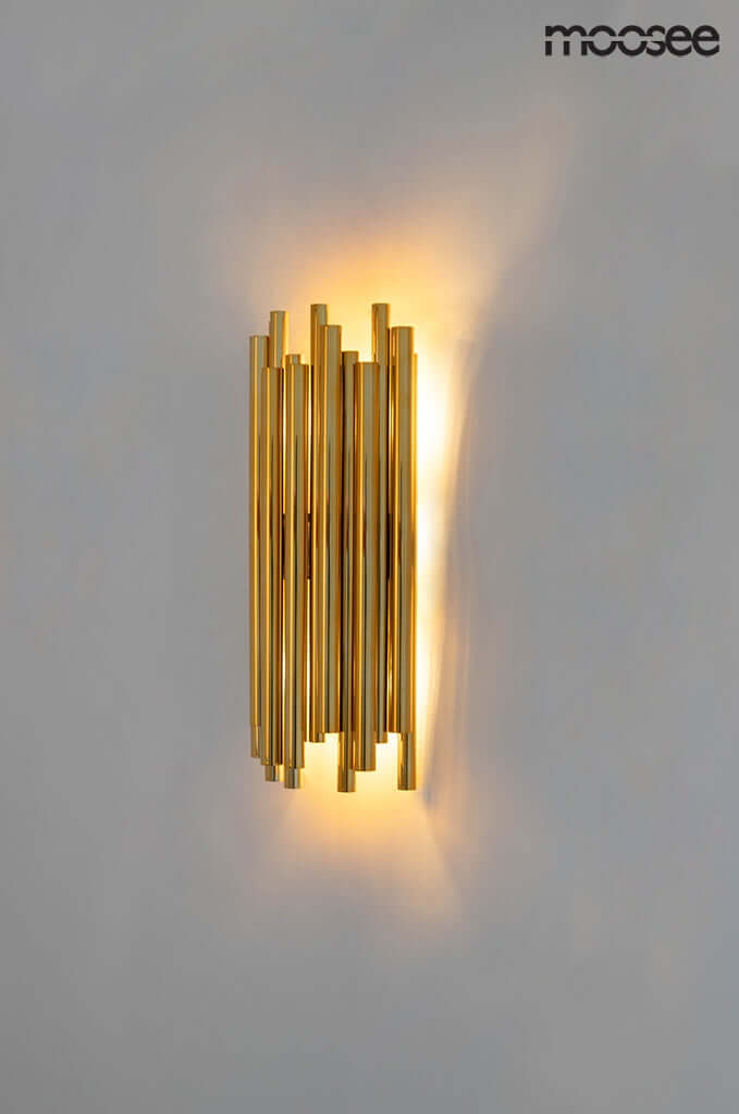 7. Lámpara de pared Tubo dorada