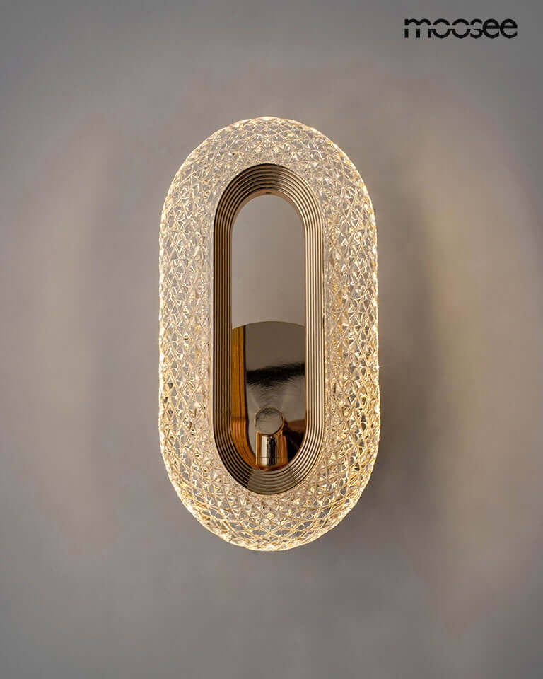 Lámpara de pared joya dorada