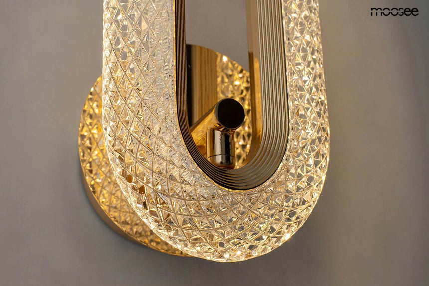 Lámpara de pared joya dorada