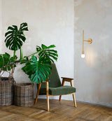 Lámpara de pared Riva dorada