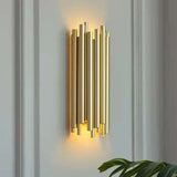 7. Lámpara de pared Tubo dorada